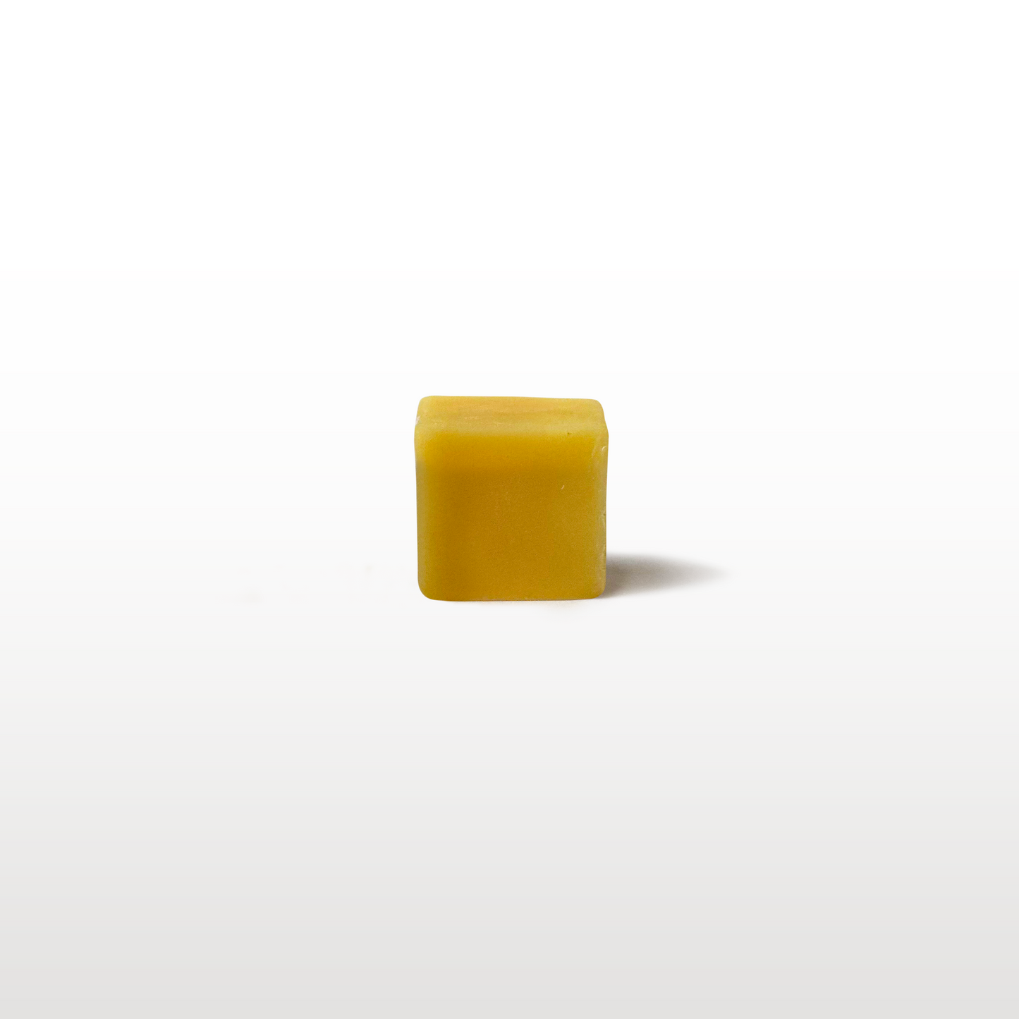 a small cube of wax
